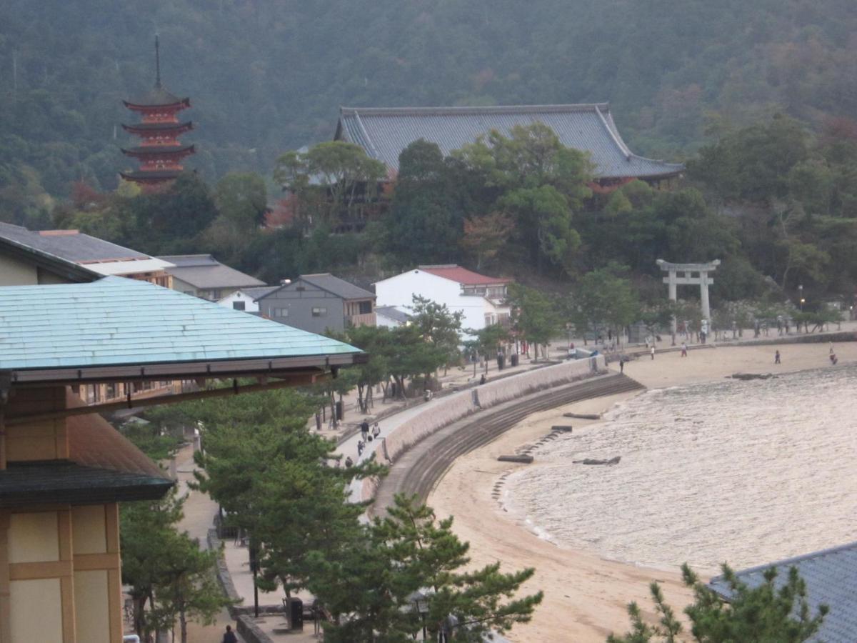 Sakuraya Hotel Hatsukaichi Bagian luar foto