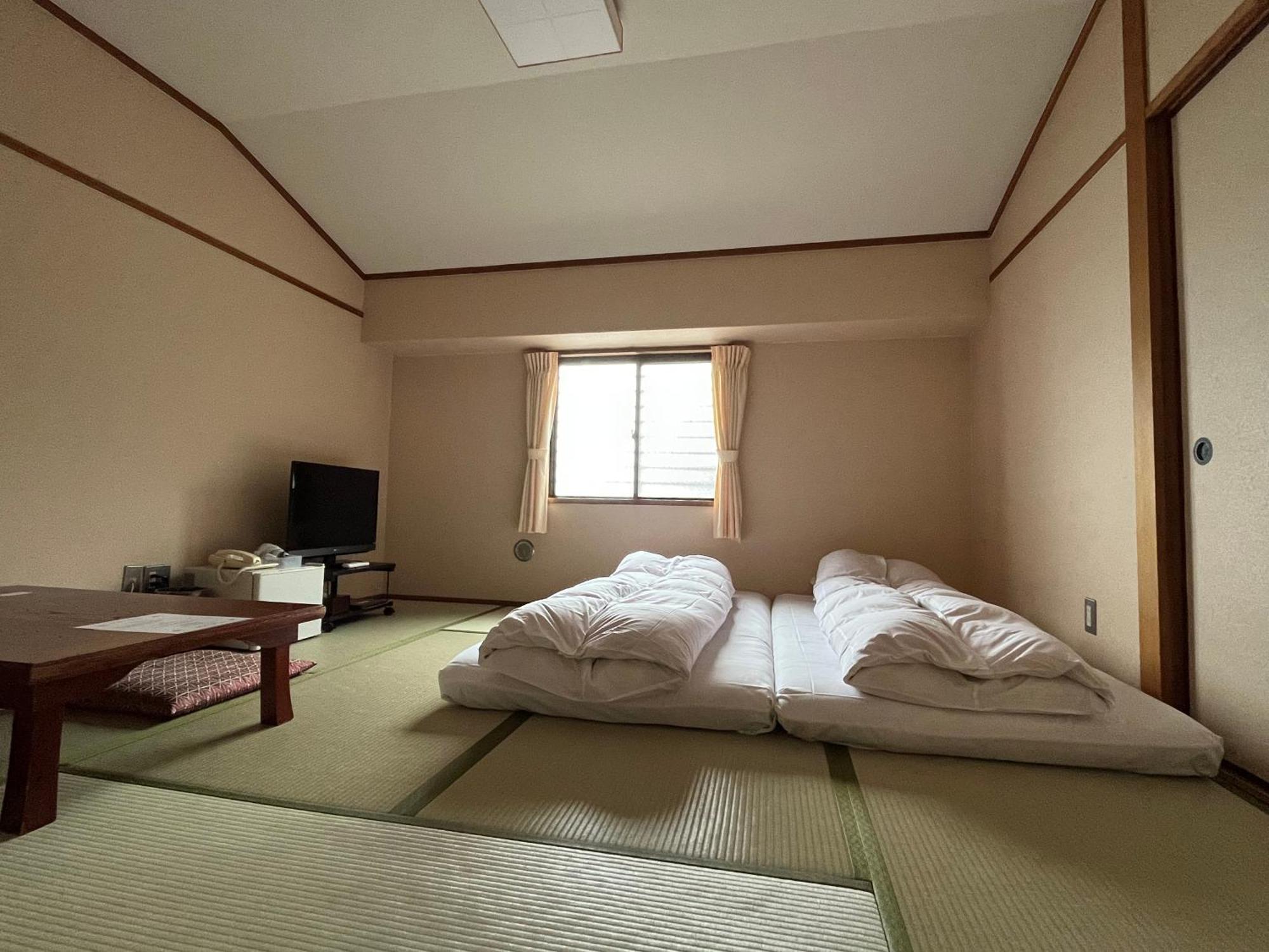 Sakuraya Hotel Hatsukaichi Bagian luar foto