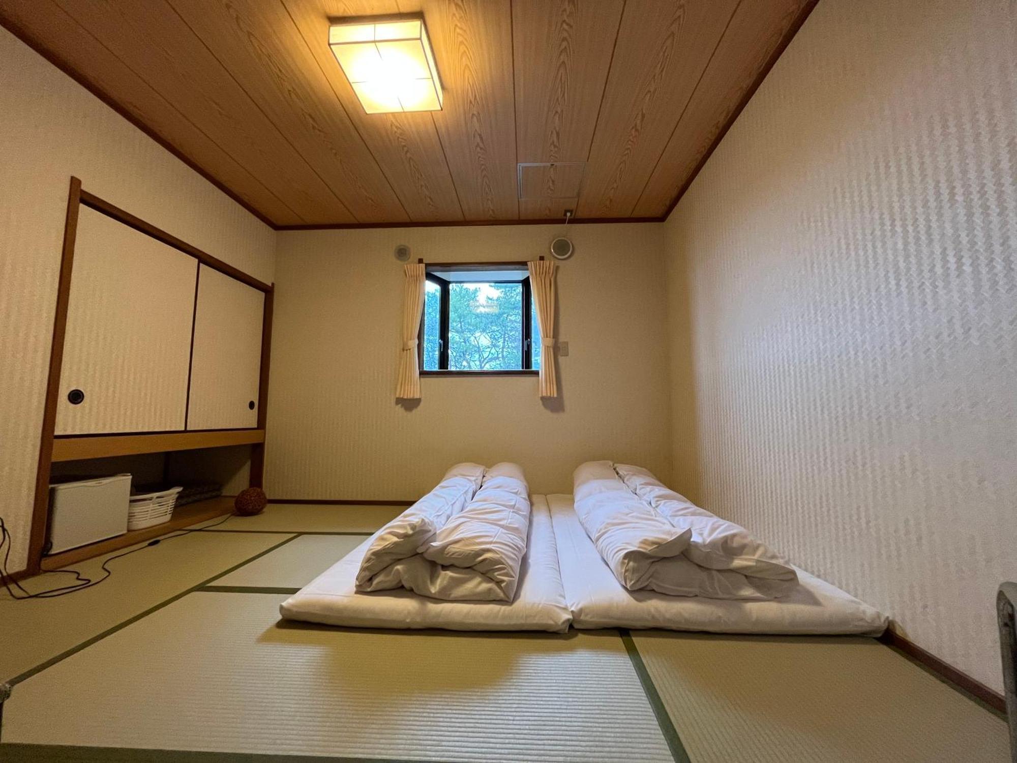 Sakuraya Hotel Hatsukaichi Bagian luar foto