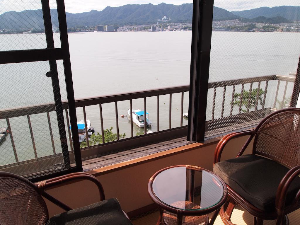 Sakuraya Hotel Hatsukaichi Bagian luar foto