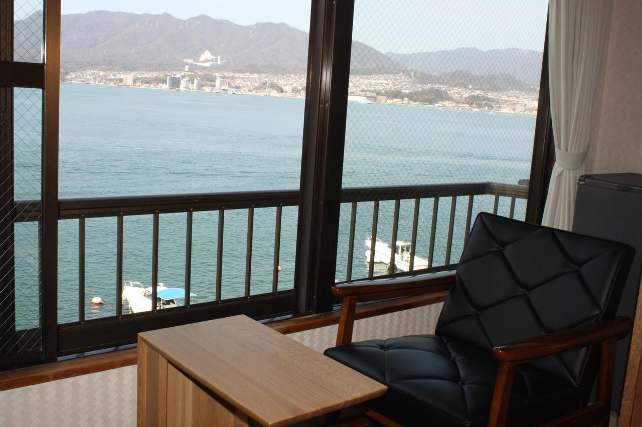 Sakuraya Hotel Hatsukaichi Bagian luar foto