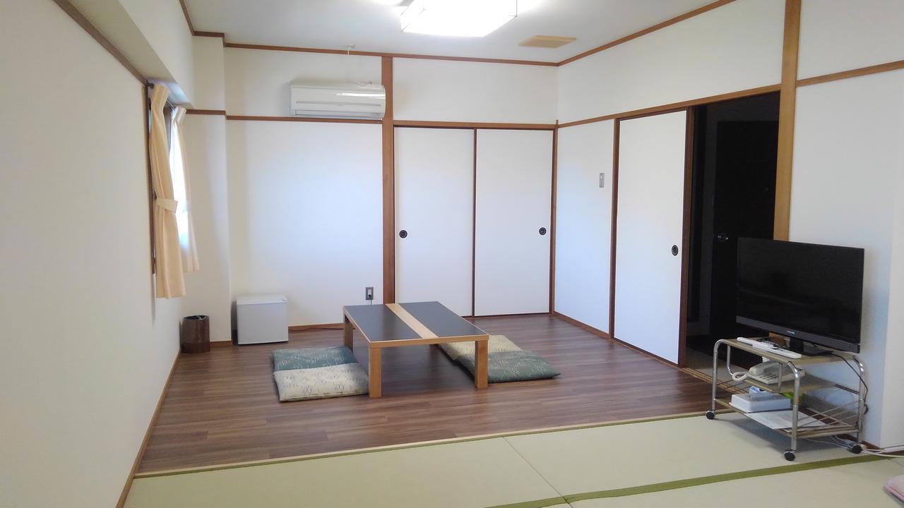 Sakuraya Hotel Hatsukaichi Bagian luar foto
