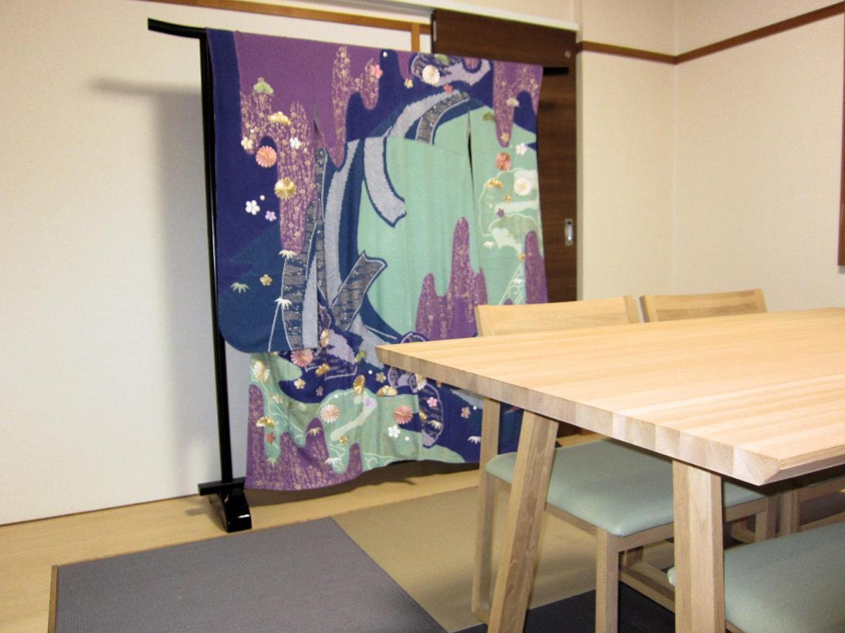 Sakuraya Hotel Hatsukaichi Bagian luar foto