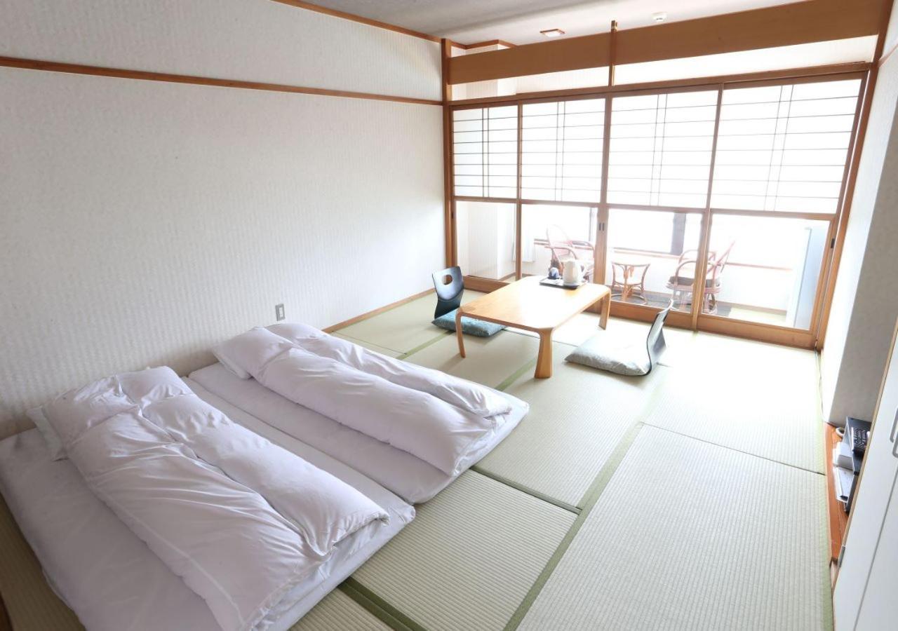 Sakuraya Hotel Hatsukaichi Bagian luar foto